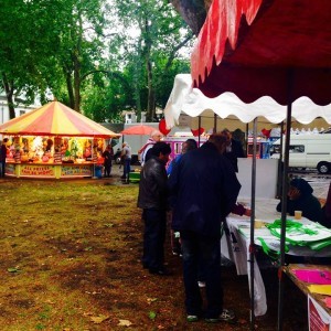 Festival goers of many faiths and nationalities checking the stalls 